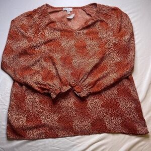 Women's top by Jessica Simpson.